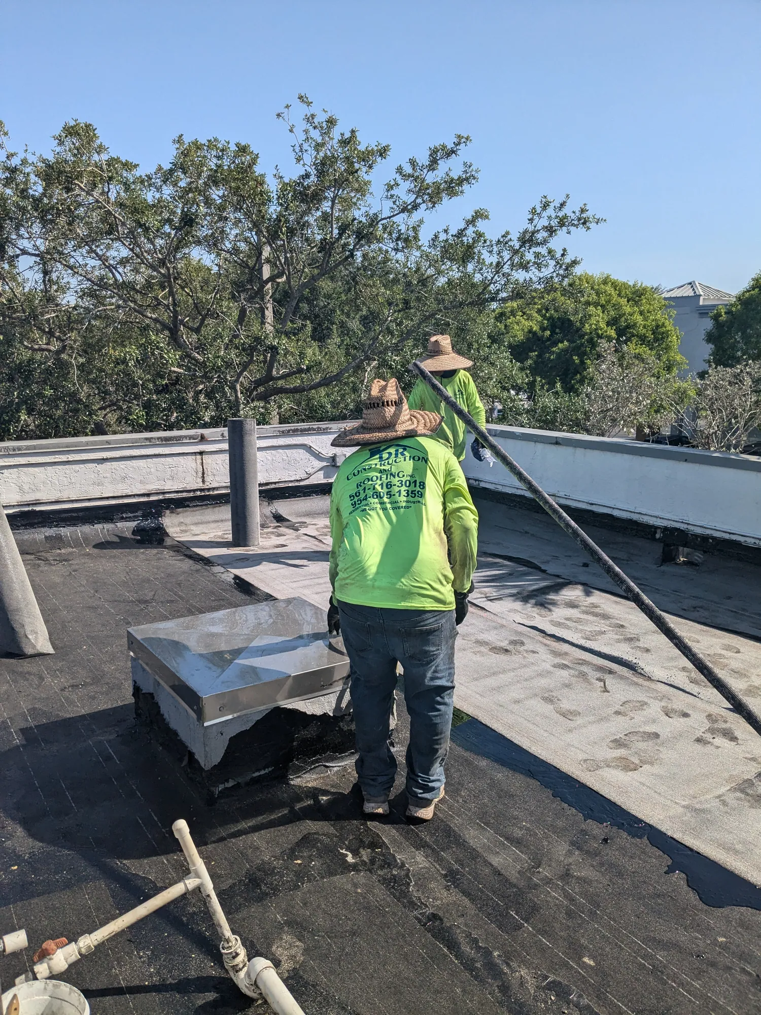 Commercial flat roof hot-mop installation by DR Construction & Roofing in South Florida