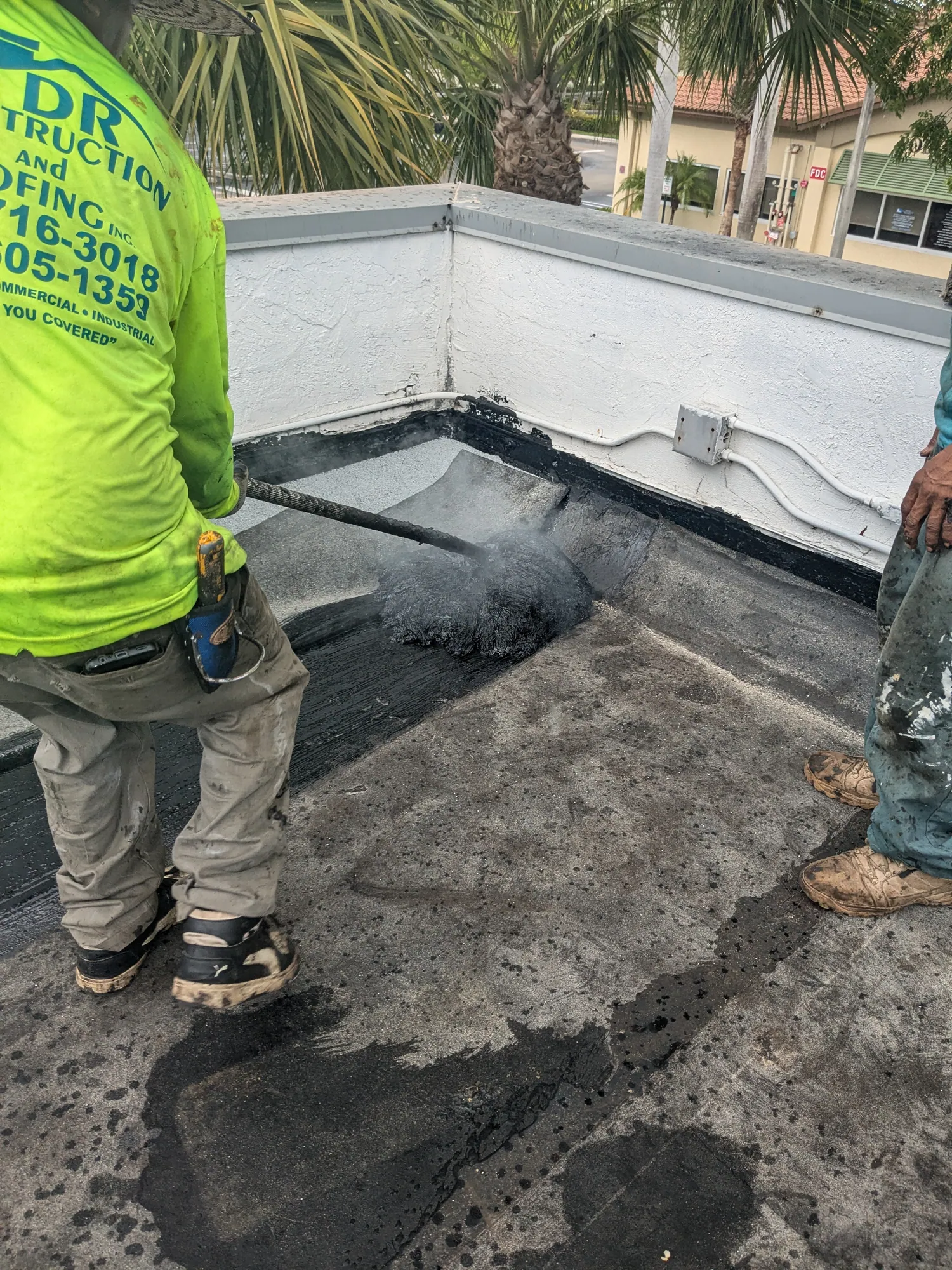 Commercial flat roof hot-mop installation by DR Construction & Roofing in South Florida