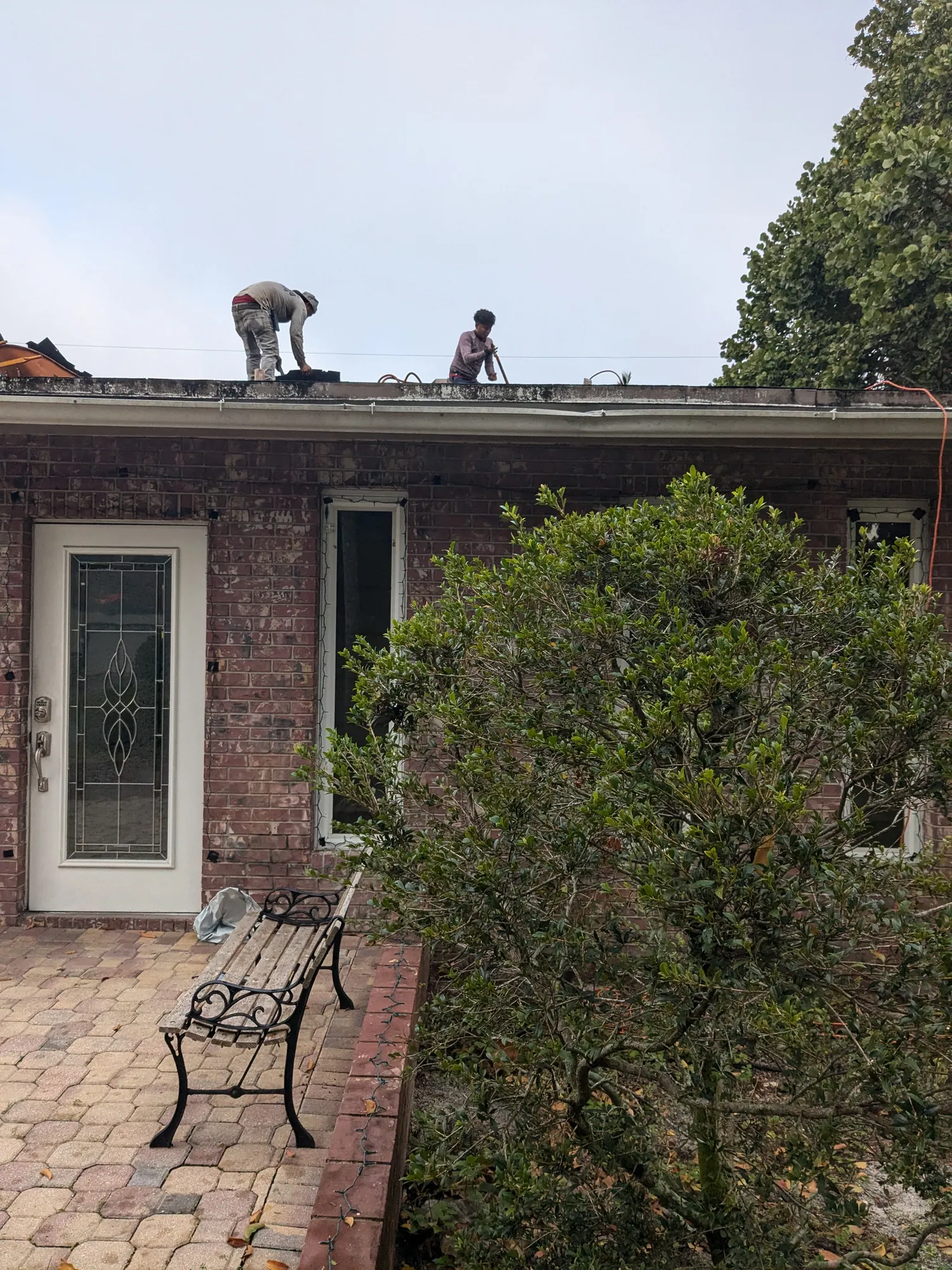 Grey architectural shingle re-roof by DR Construction & Roofing in South Florida