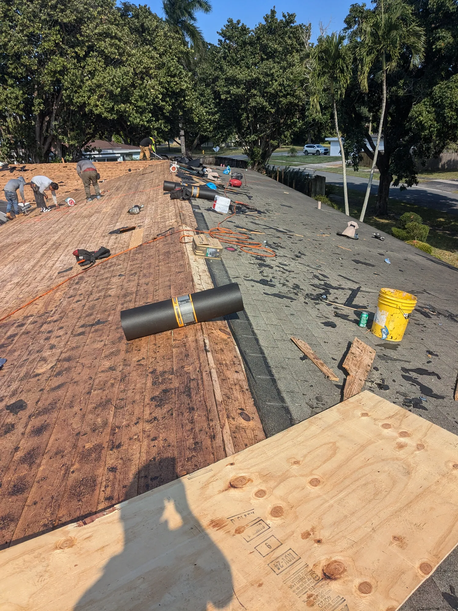 Grey architectural shingle re-roof by DR Construction & Roofing in South Florida