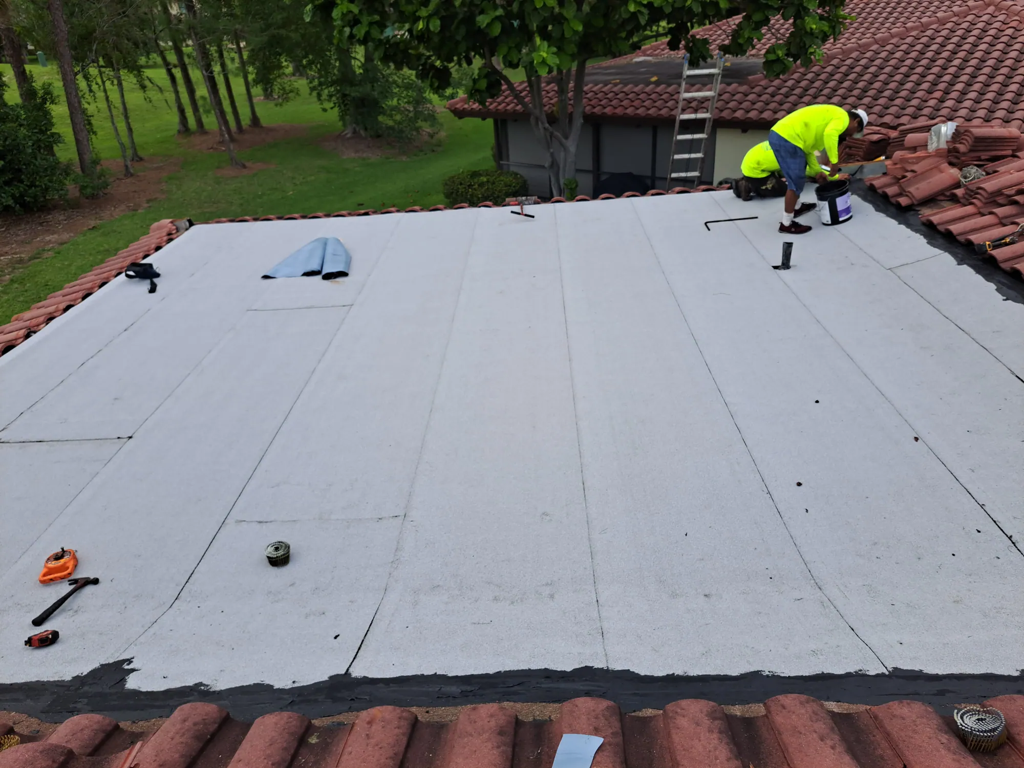 Residential flat roof peel-and-stick membrane by DR Construction & Roofing in South Florida