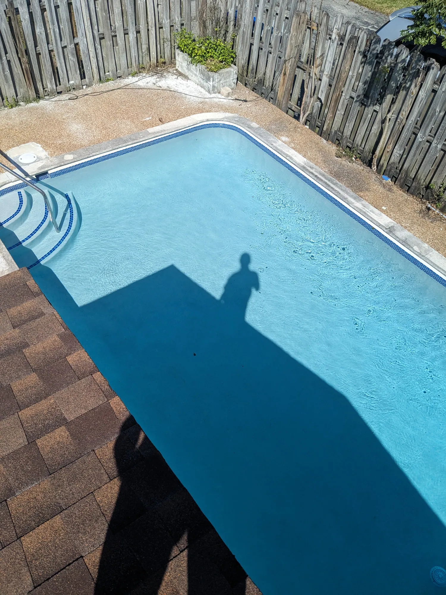 Brown architectural shingle re-roof by DR Construction & Roofing in South Florida