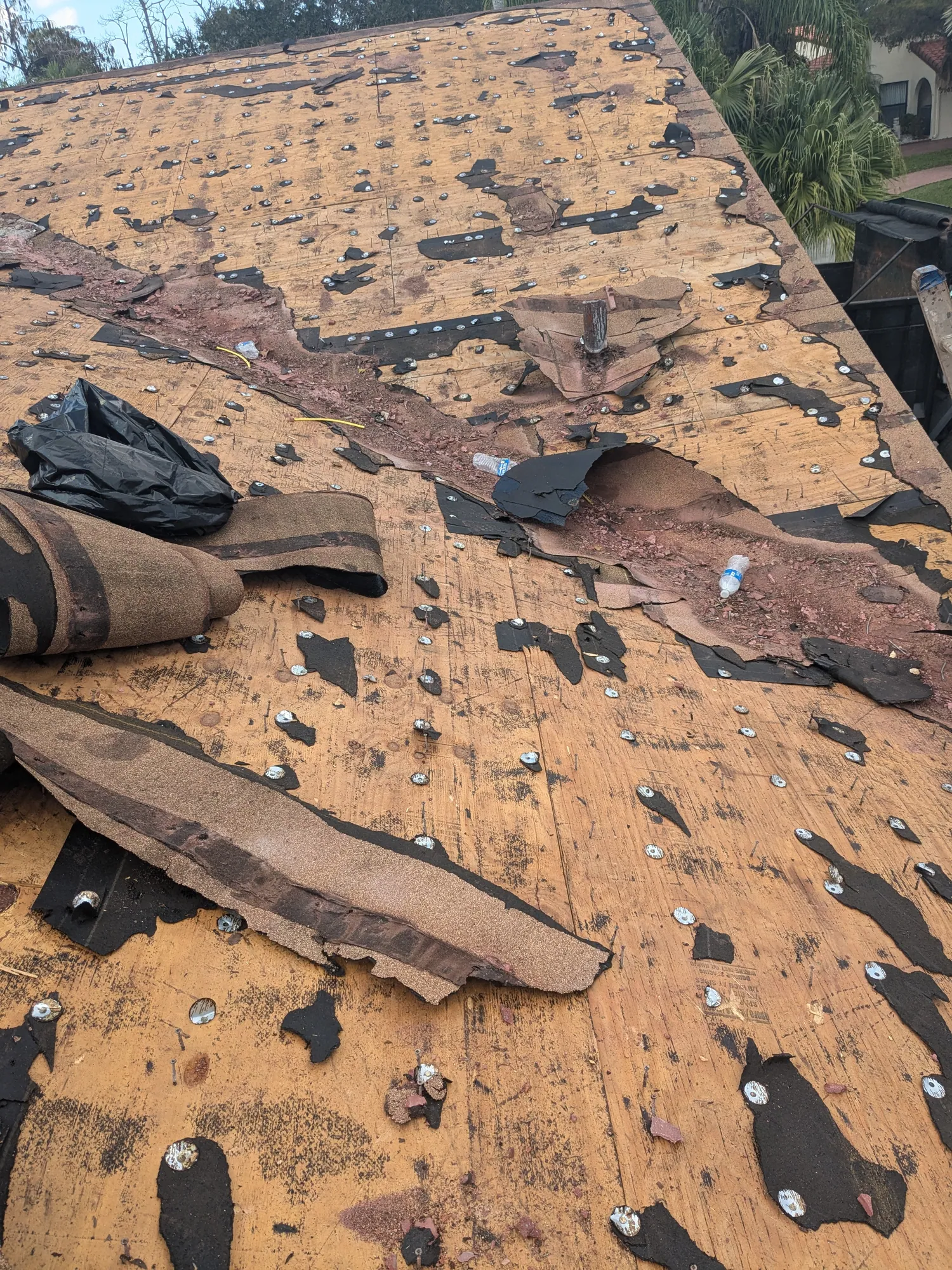 Terracotta barrel tile roof installation by DR Construction & Roofing in South Florida