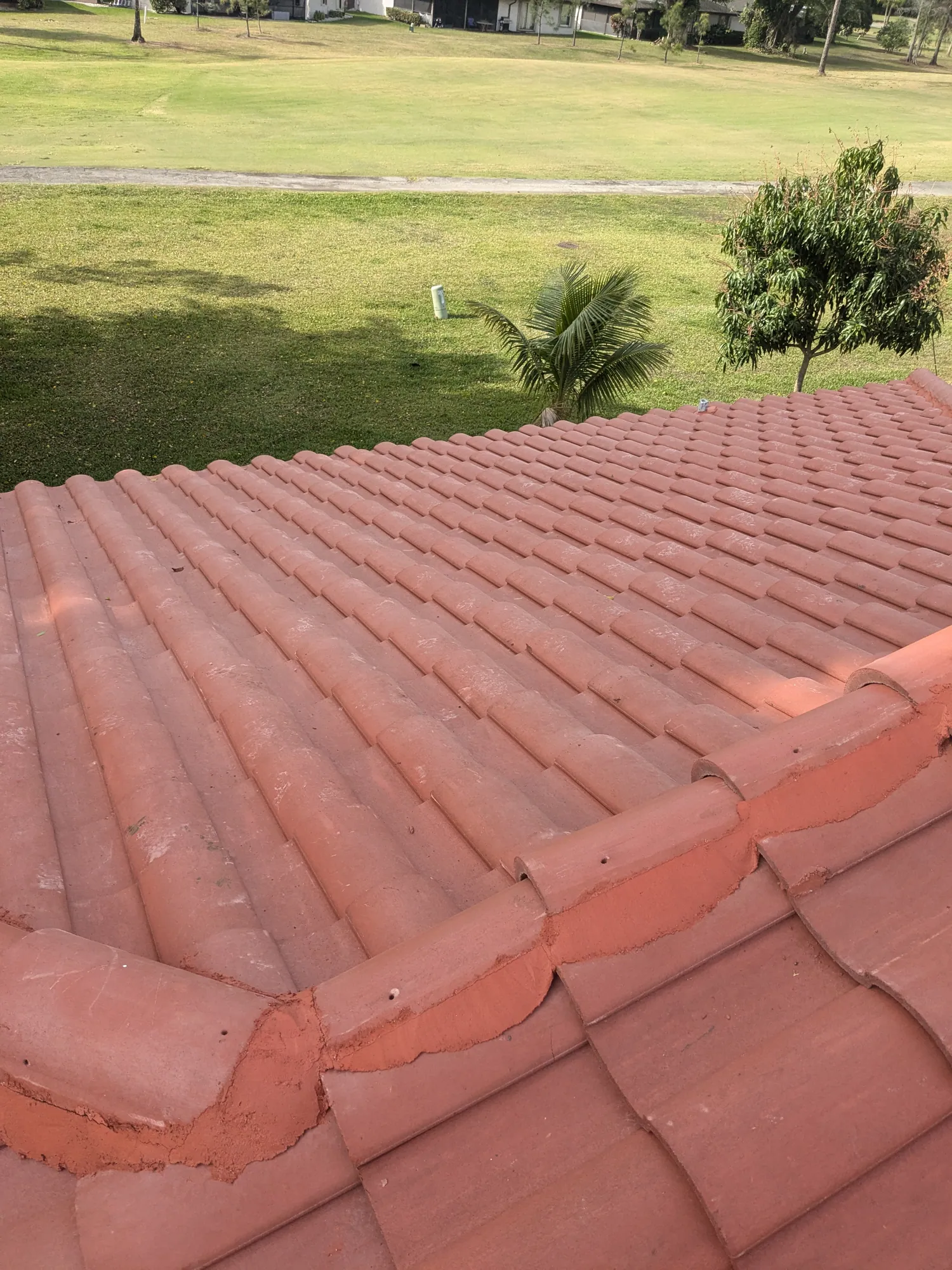 Terracotta barrel tile roof installation by DR Construction & Roofing in South Florida