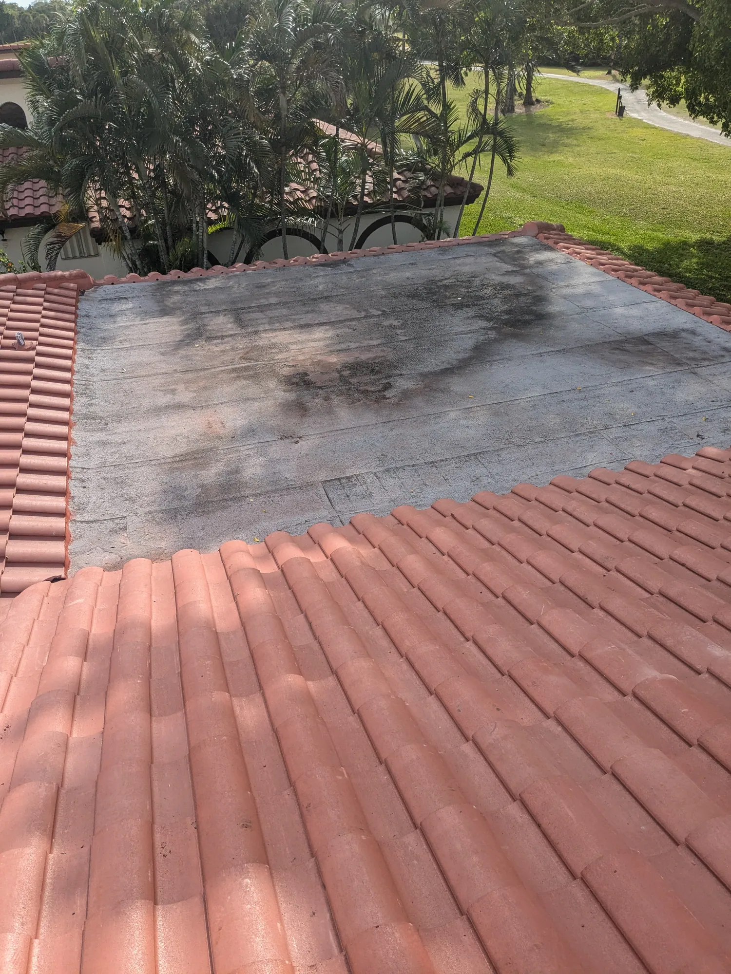 Terracotta barrel tile roof installation by DR Construction & Roofing in South Florida