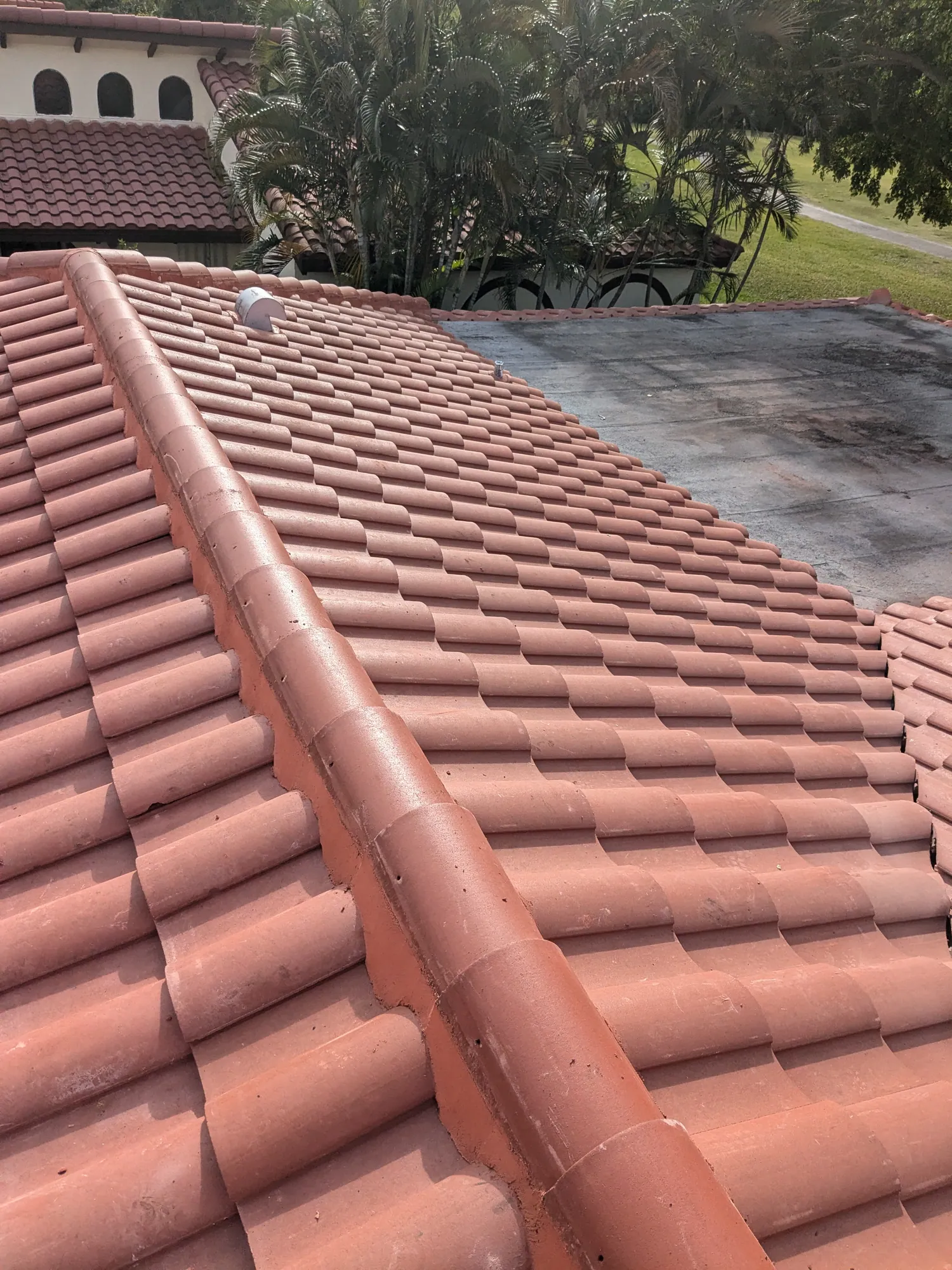 Terracotta barrel tile roof installation by DR Construction & Roofing in South Florida