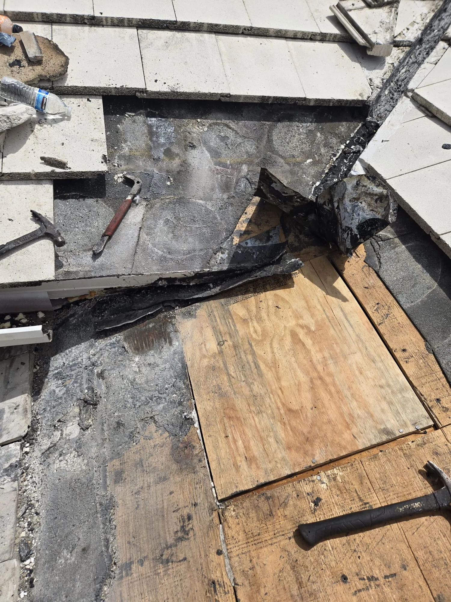 Residential tile roof repair by DR Construction & Roofing in South Florida