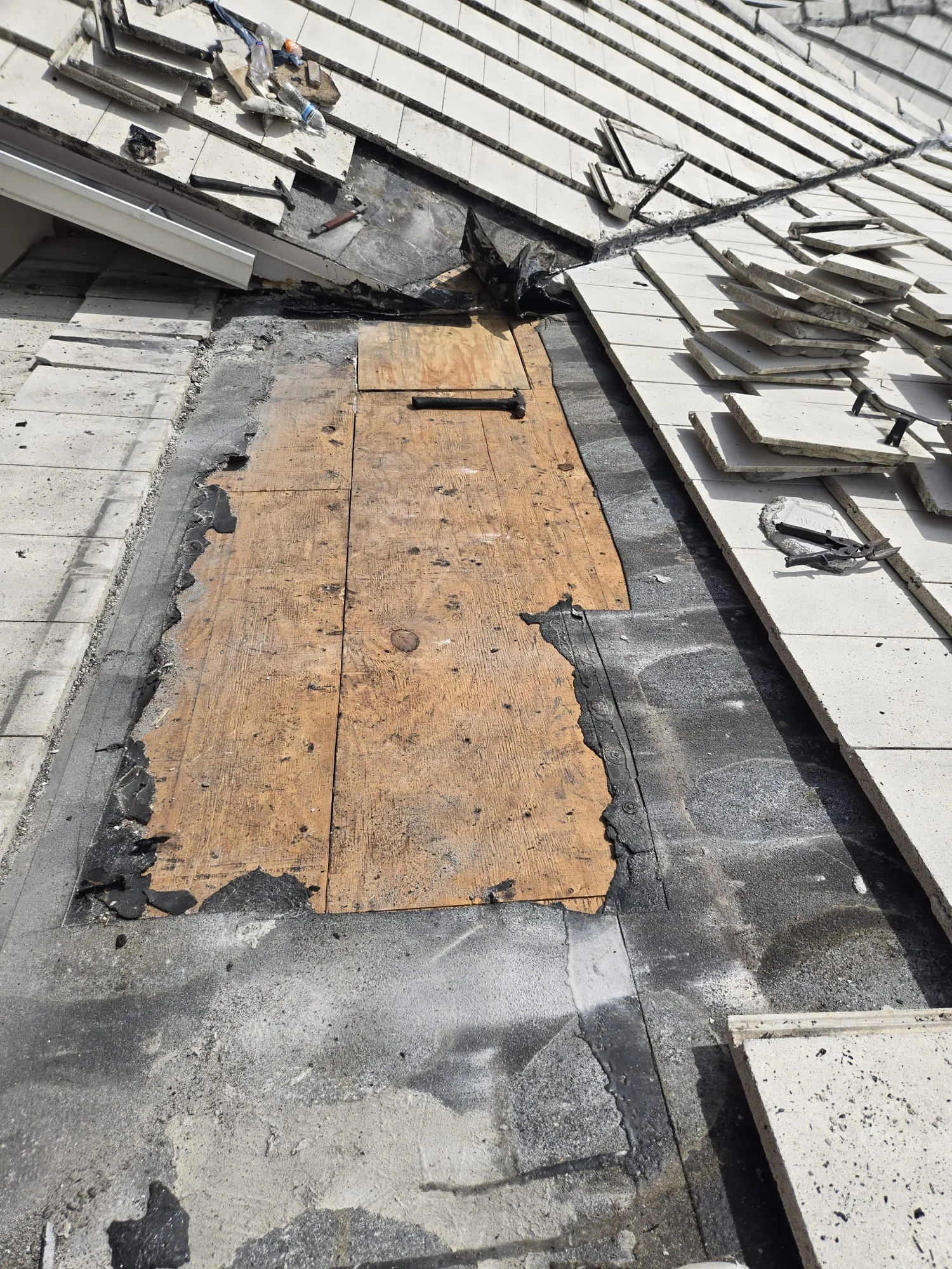 Residential tile roof repair by DR Construction & Roofing in South Florida