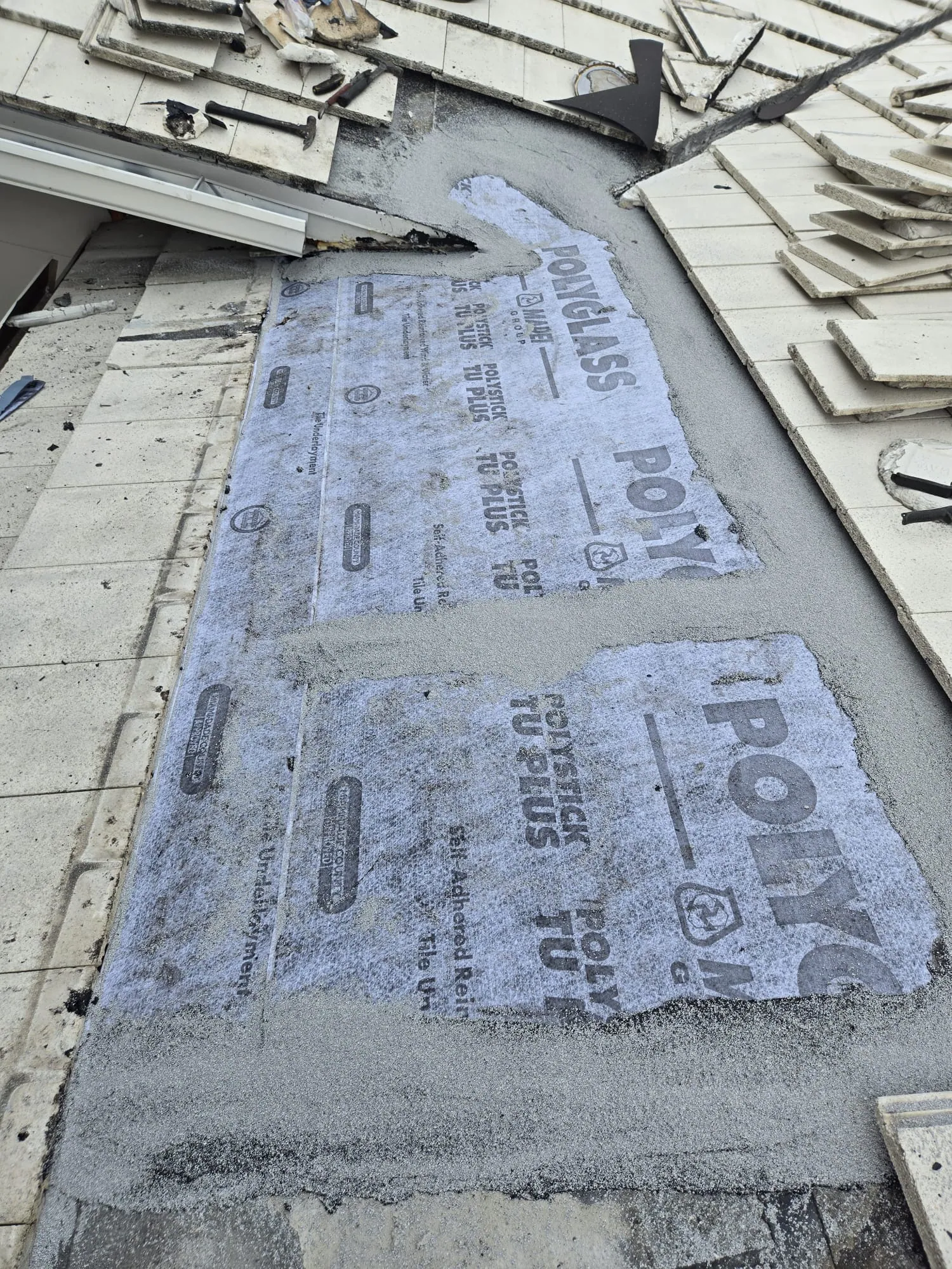 Residential tile roof repair by DR Construction & Roofing in South Florida